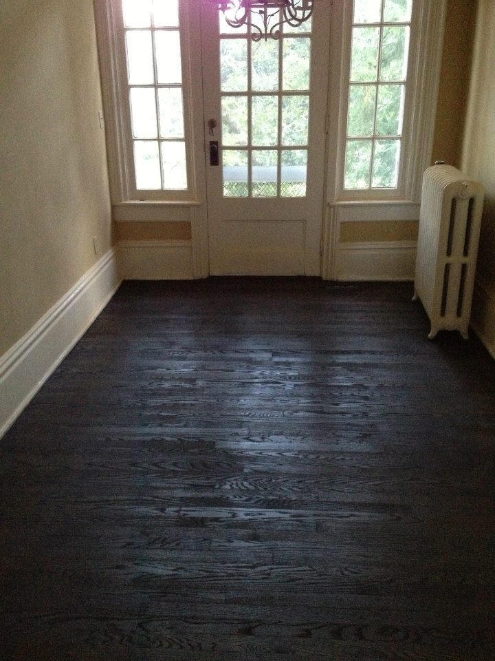 A black hardwood floor after a Fabulous Floors refinishing in Chicago, IL